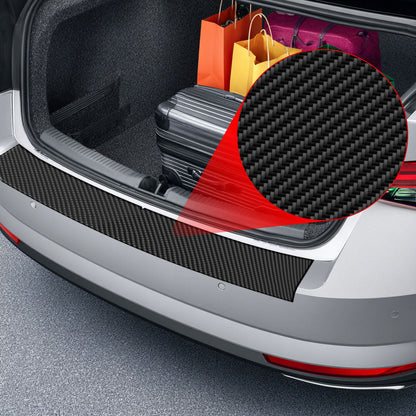 Open trunk with luggage; close-up of GrizzProtector Kohlenstoff Schutzfolie für Ladekante on Mercedes A Klasse W177.